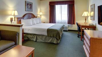 Desk, iron/ironing board, bed sheets