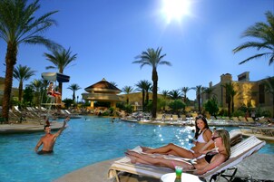 Outdoor pool, pool umbrellas, sun loungers