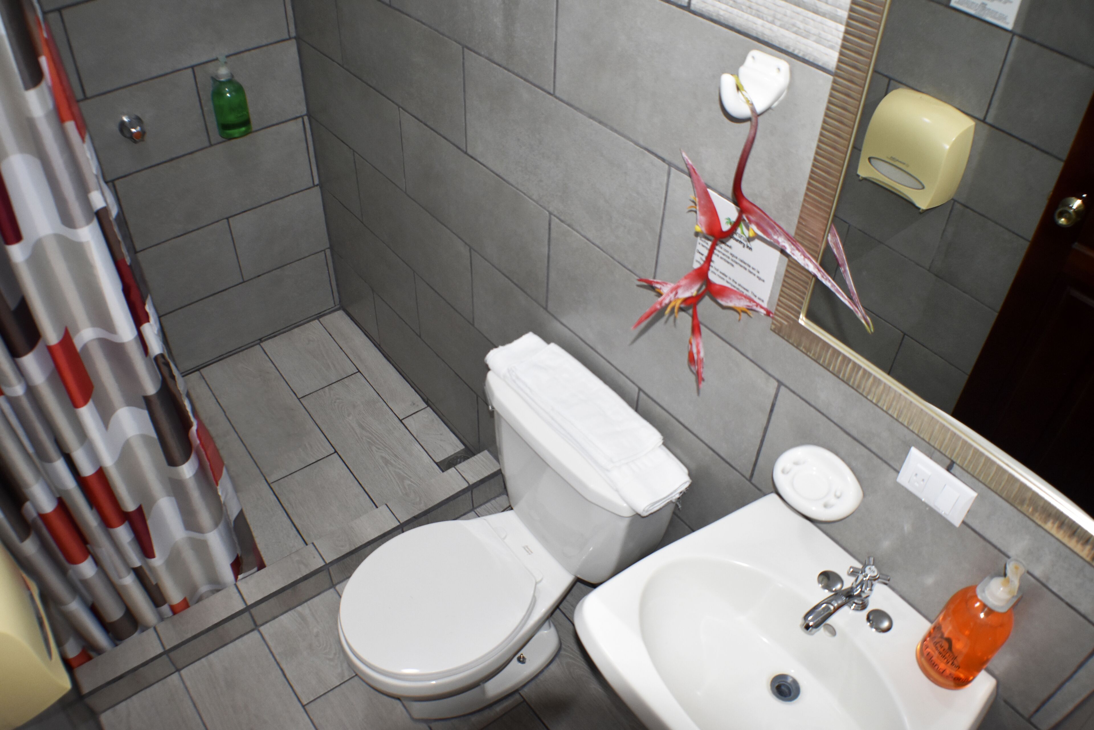 standard double room, 2 double beds | bathroom | shower, rainfall showerhead, hair dryer, towels