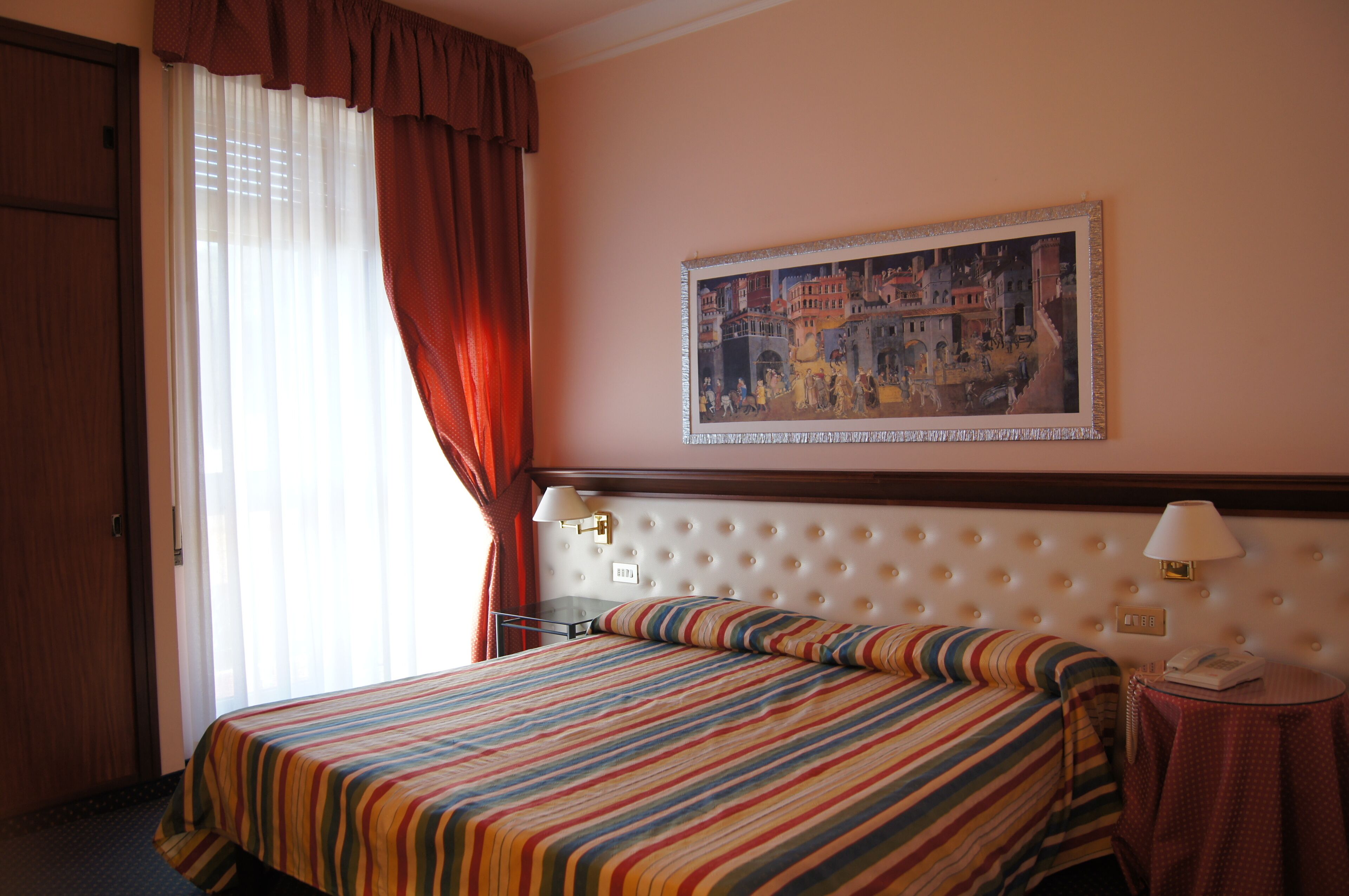 Down comforters, minibar, in-room safe, desk