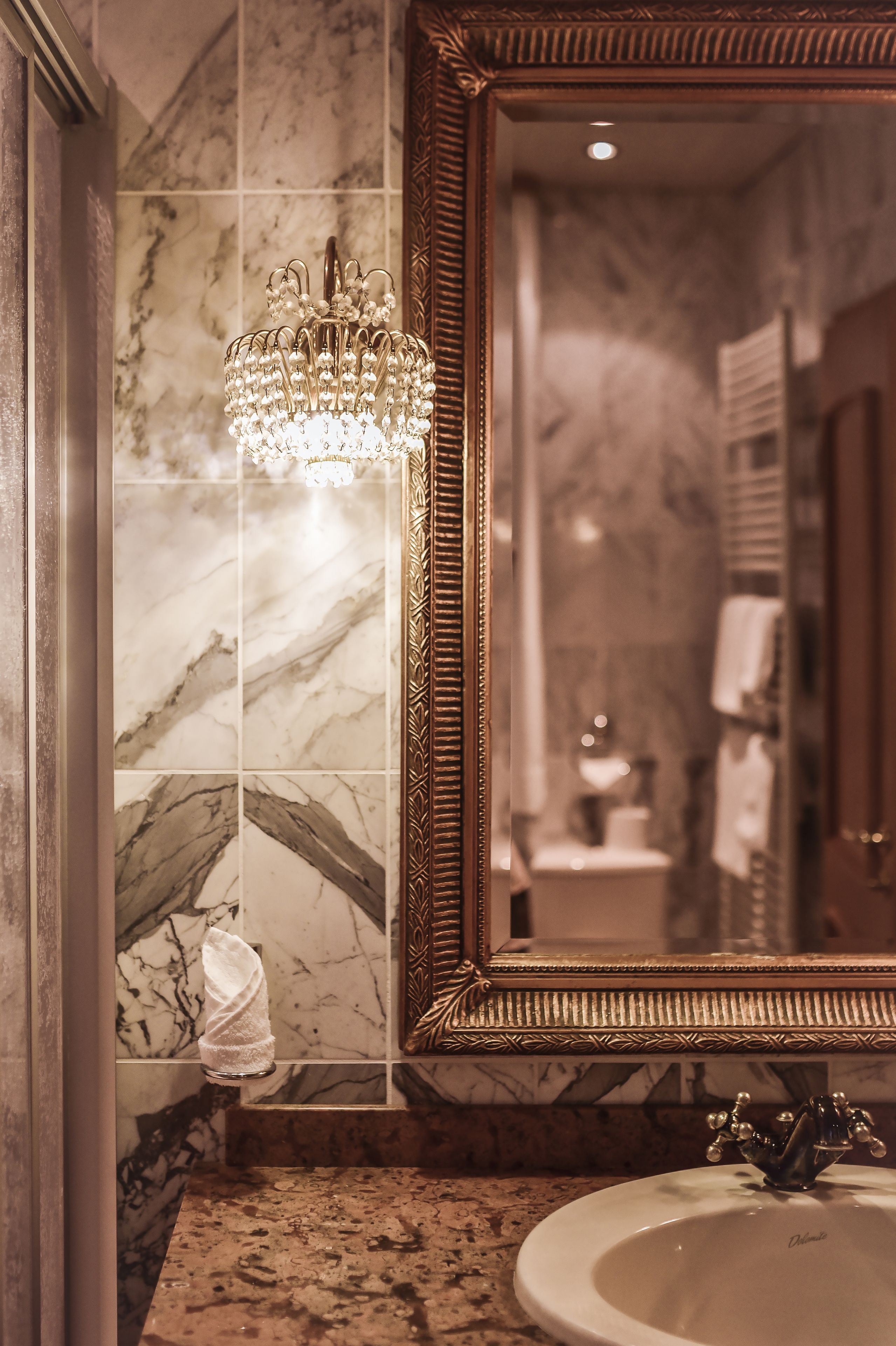 shower, designer toiletries, hair dryer, towels