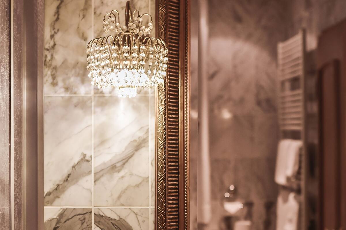 shower, designer toiletries, hair dryer, towels