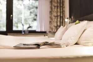 Ropa de cama de alta calidad, camas con pillow-top y minibar 