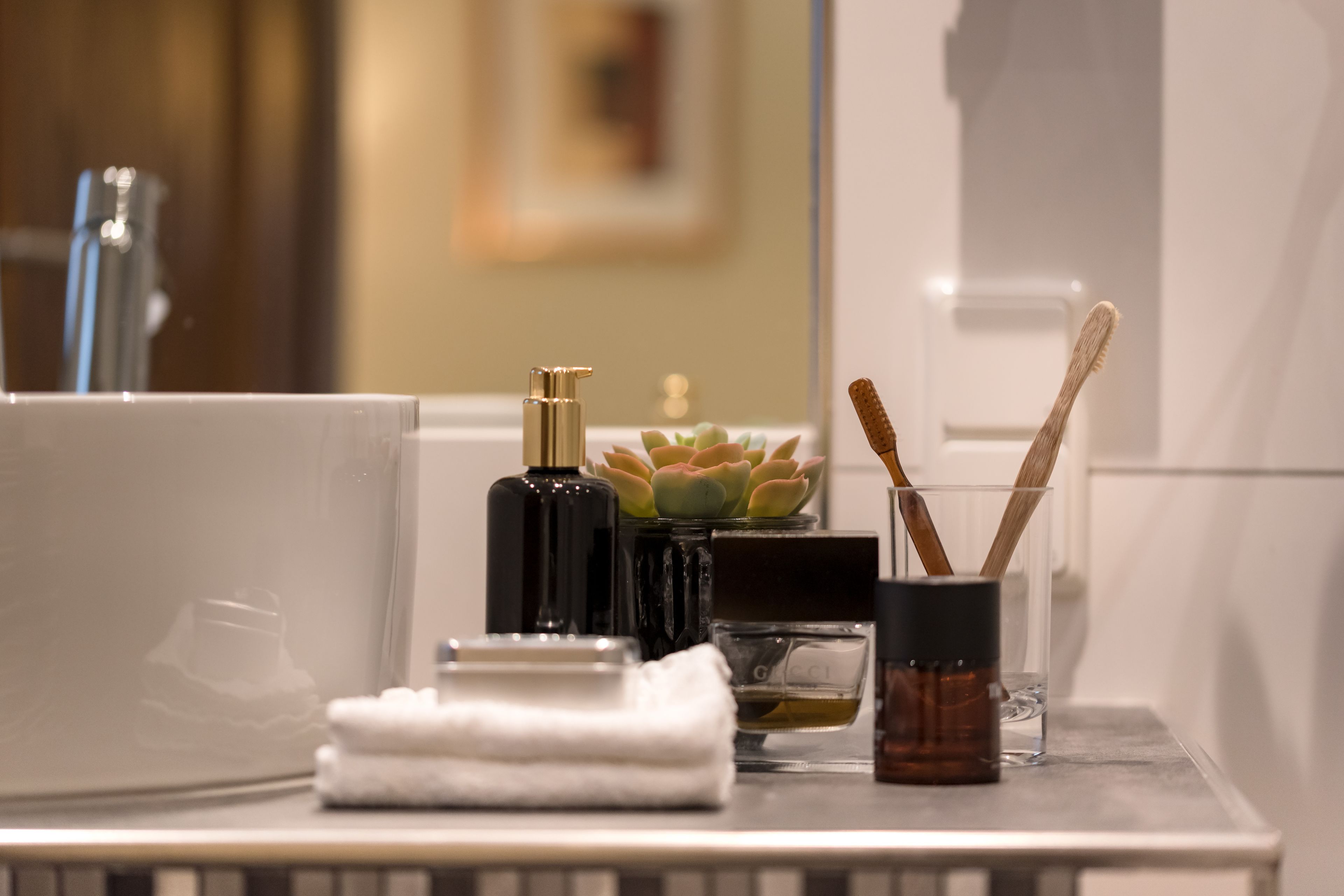 shower, designer toiletries, hair dryer, towels