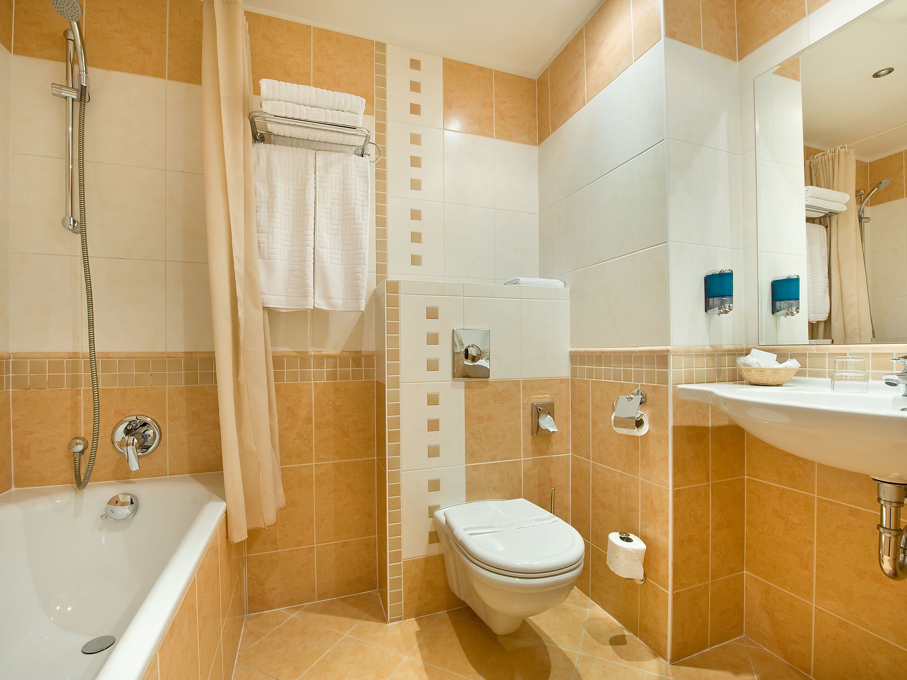 combined shower/bathtub, hair dryer, bathrobes, towels