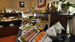 A buffet with various food items and condiments. - EA Hotel Jelení dvůr Prague Castle (Prague)