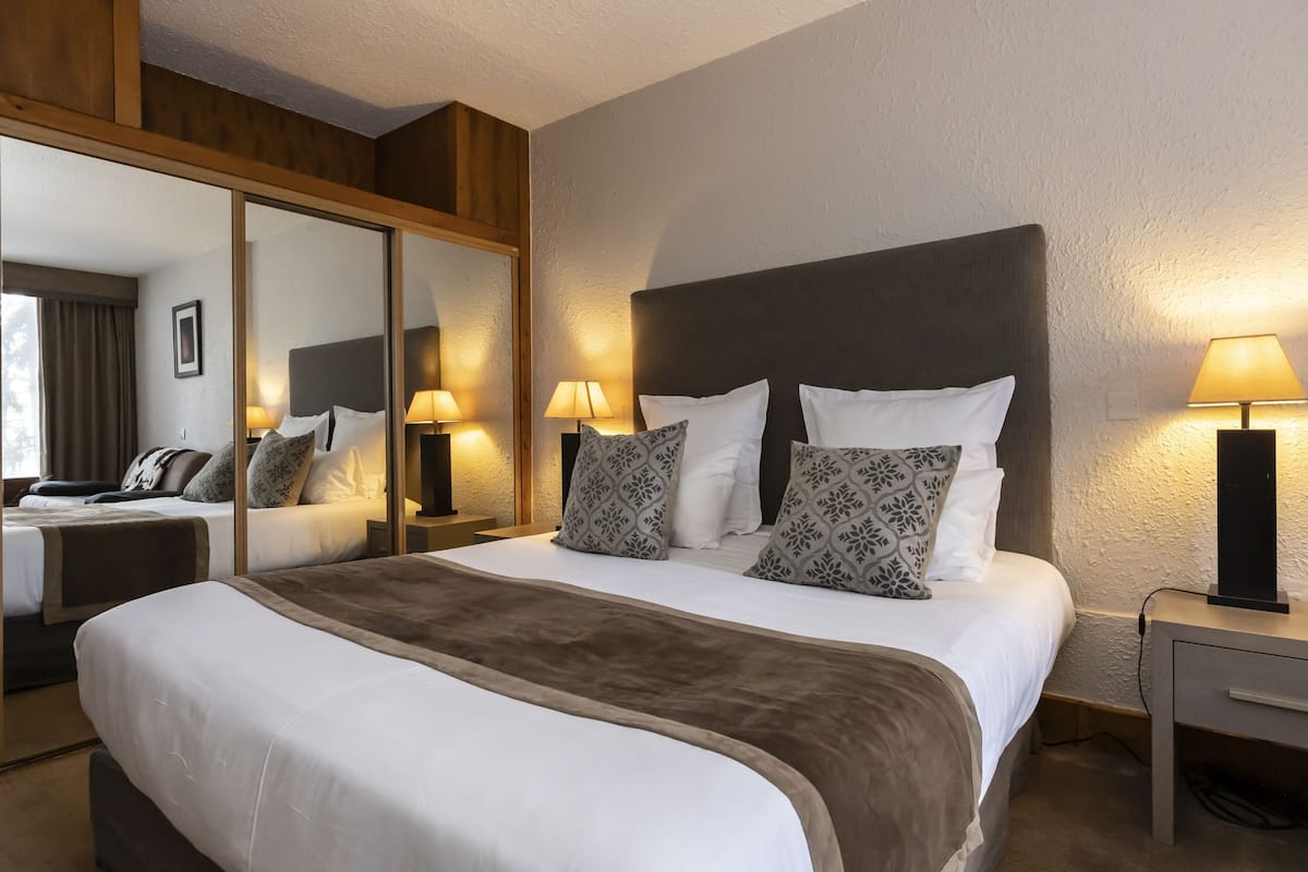 In-room safe, blackout drapes, cribs (free), WiFi (free)