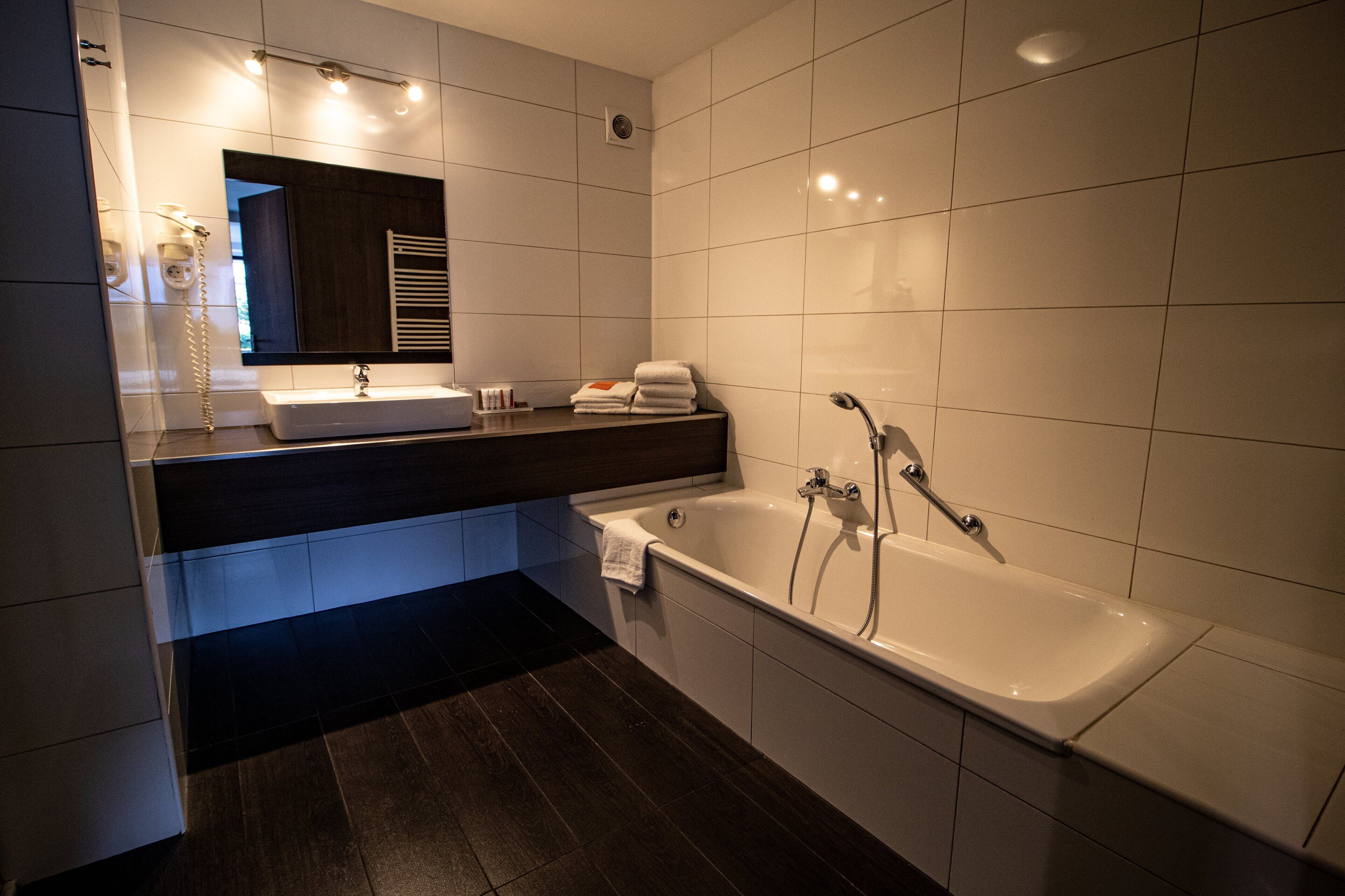 superior room | bathroom | rainfall showerhead, free toiletries, hair dryer, towels