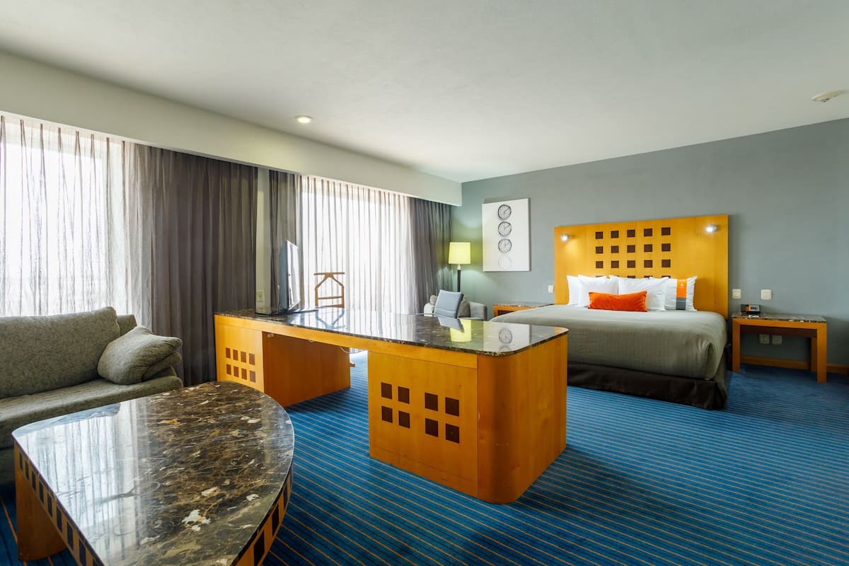 junior suite | premium bedding, in-room safe, desk, blackout curtains