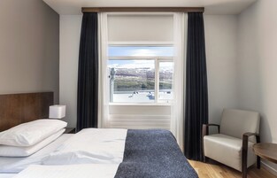 Standard Double Plus | Hypo-allergenic bedding, down comforters, in-room safe, desk