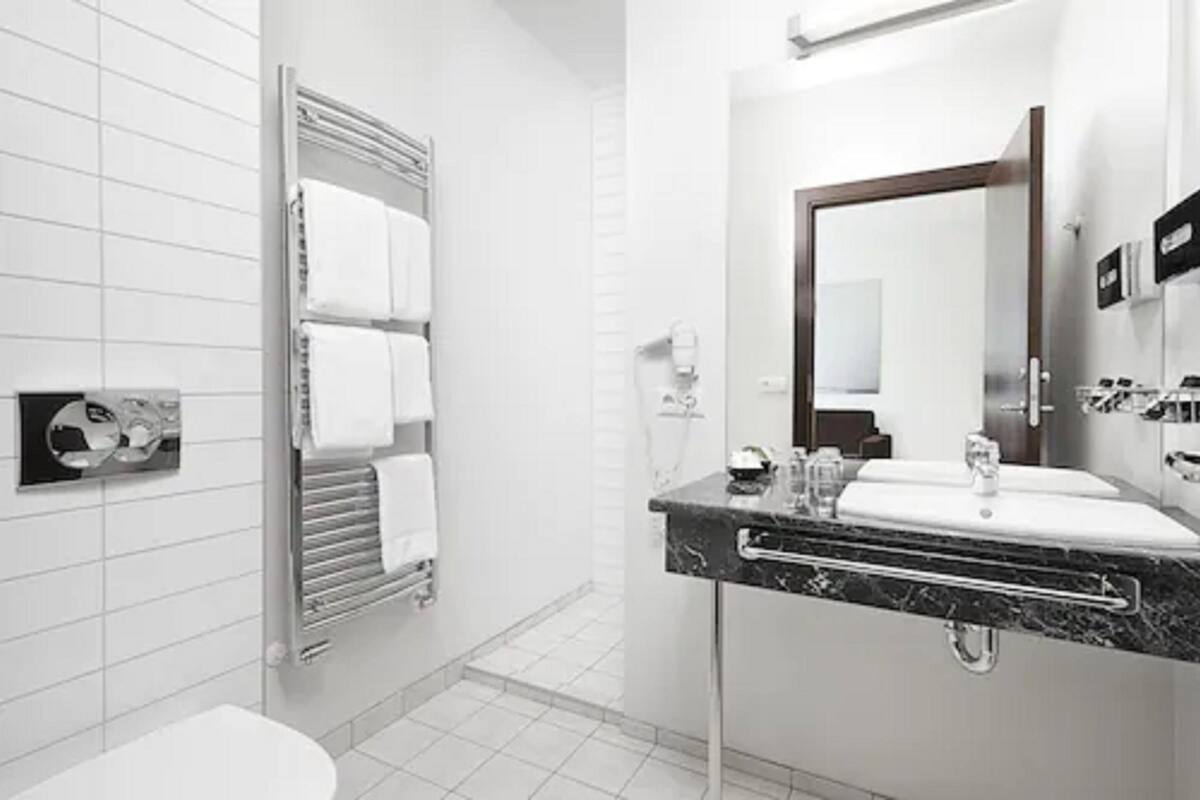 family room | bathroom | shower, free toiletries, hair dryer, towels