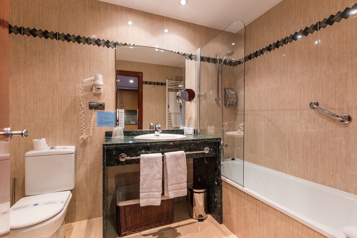Bathroom | Hair dryer, bidet, towels, soap