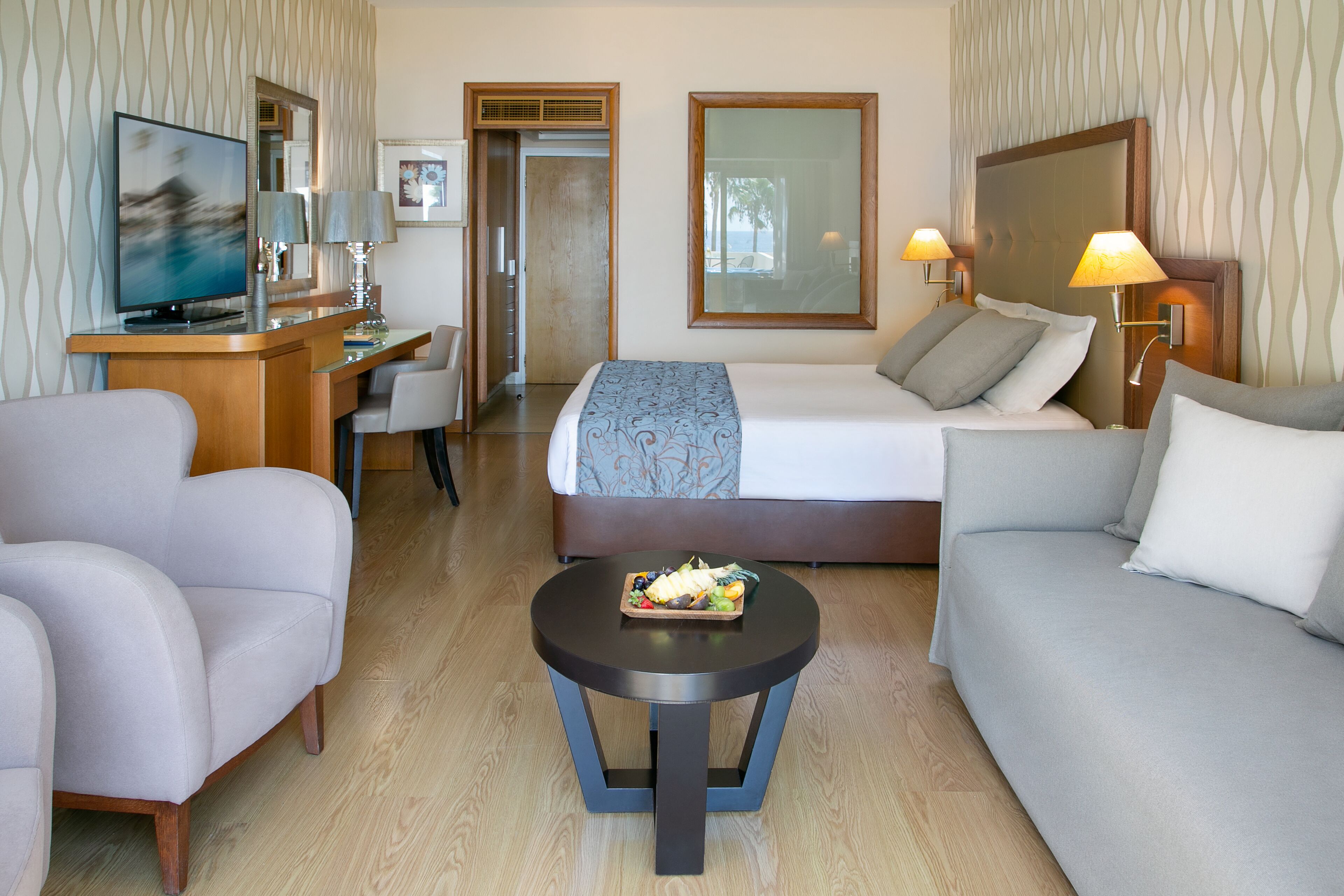 Deluxe Terrace Suite Sea View with Outdoor Whirlpool | Living area | Flat-screen TV