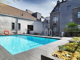 Seasonal outdoor pool, pool loungers