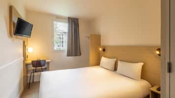 Premium bedding, desk, blackout drapes, soundproofing