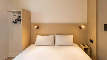 Premium bedding, desk, blackout curtains, soundproofing