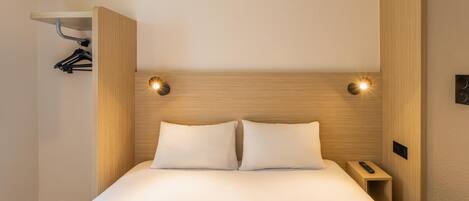 Premium bedding, desk, blackout curtains, soundproofing