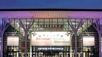 The entrance of the EREXPO LYON with 'Bienvenue' and 'Welcome' signs in multiple languages.