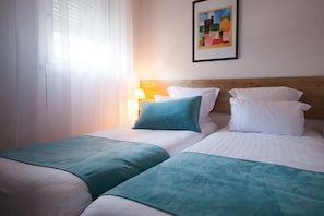 Departamento, 1 habitación | Escritorio, insonorización y tabla de planchar con plancha 