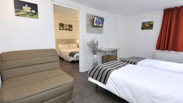 Desk, laptop workspace, blackout curtains, free WiFi