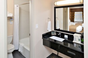 Combined shower/bathtub, hair dryer, towels, soap