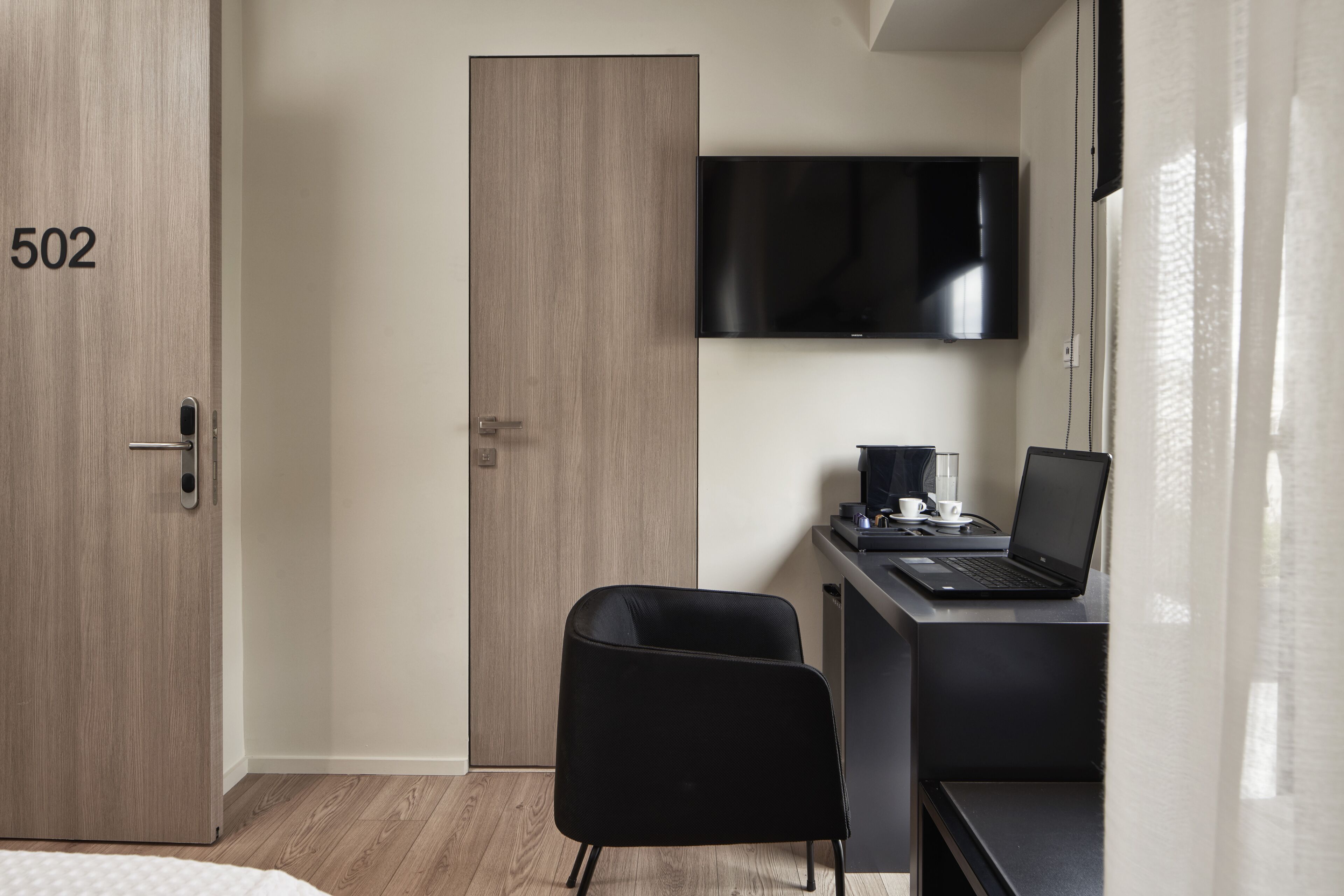 premium double room, balcony | living area | flat-screen tv