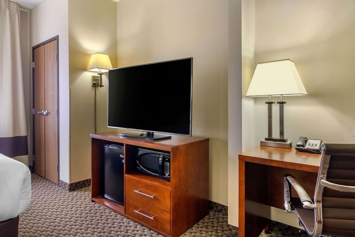 Individually furnished, desk, laptop workspace, iron/ironing board
