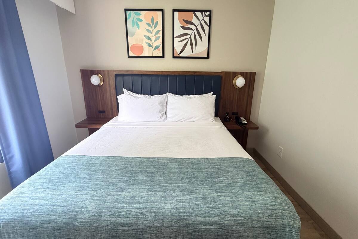 Suite, 1 Bedroom, Non Smoking (1 King Bed) | In-room safe, desk, iron/ironing board, WiFi