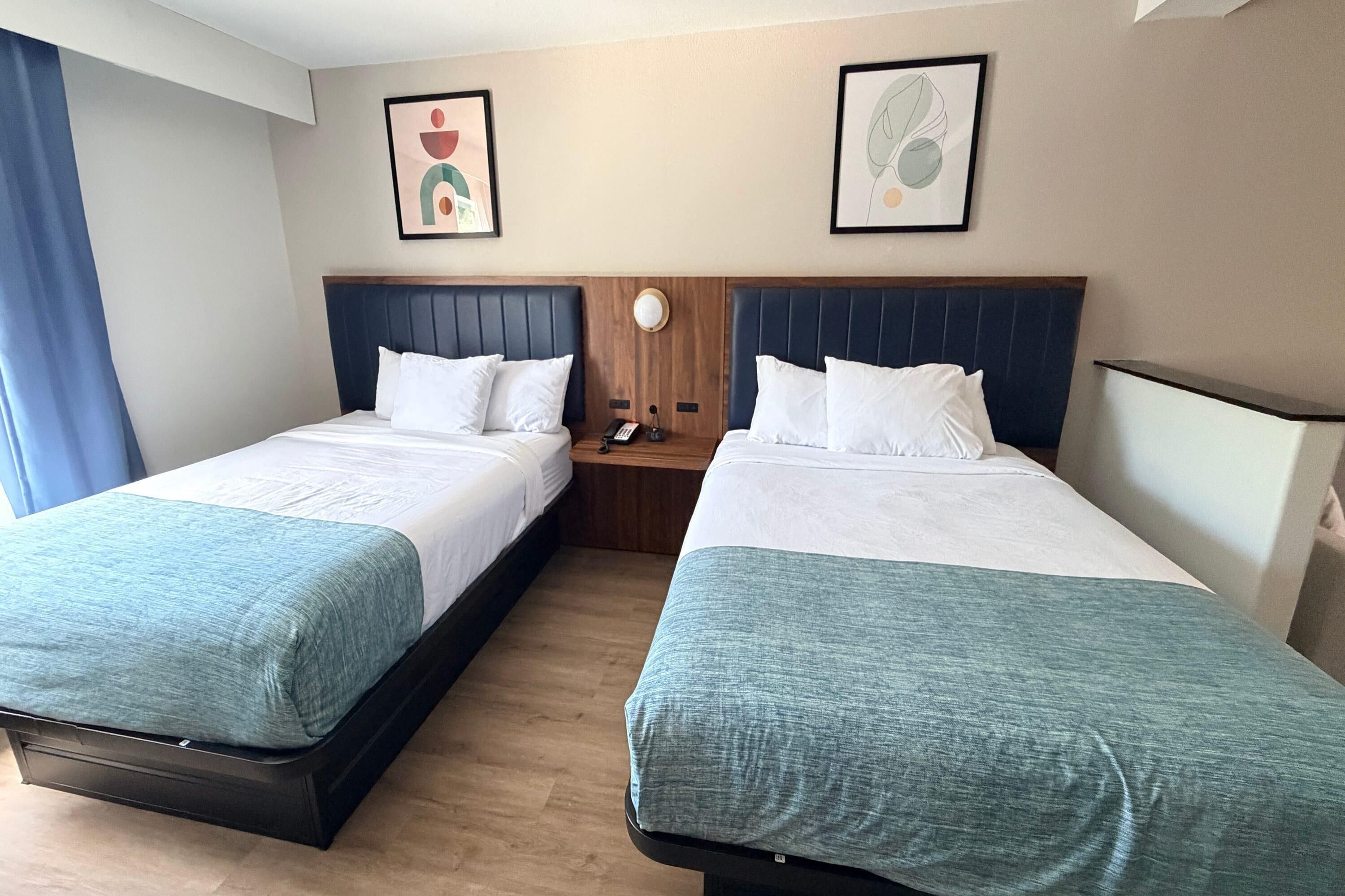 Room, 2 Queen Beds, Non Smoking | In-room safe, desk, iron/ironing board, WiFi