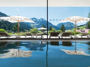 Indoor pool, outdoor pool, open 7:00 AM to 10:00 PM, pool umbrellas - A-ROSA Ifen Hotel Kleinwalsertal (Mittelberg)