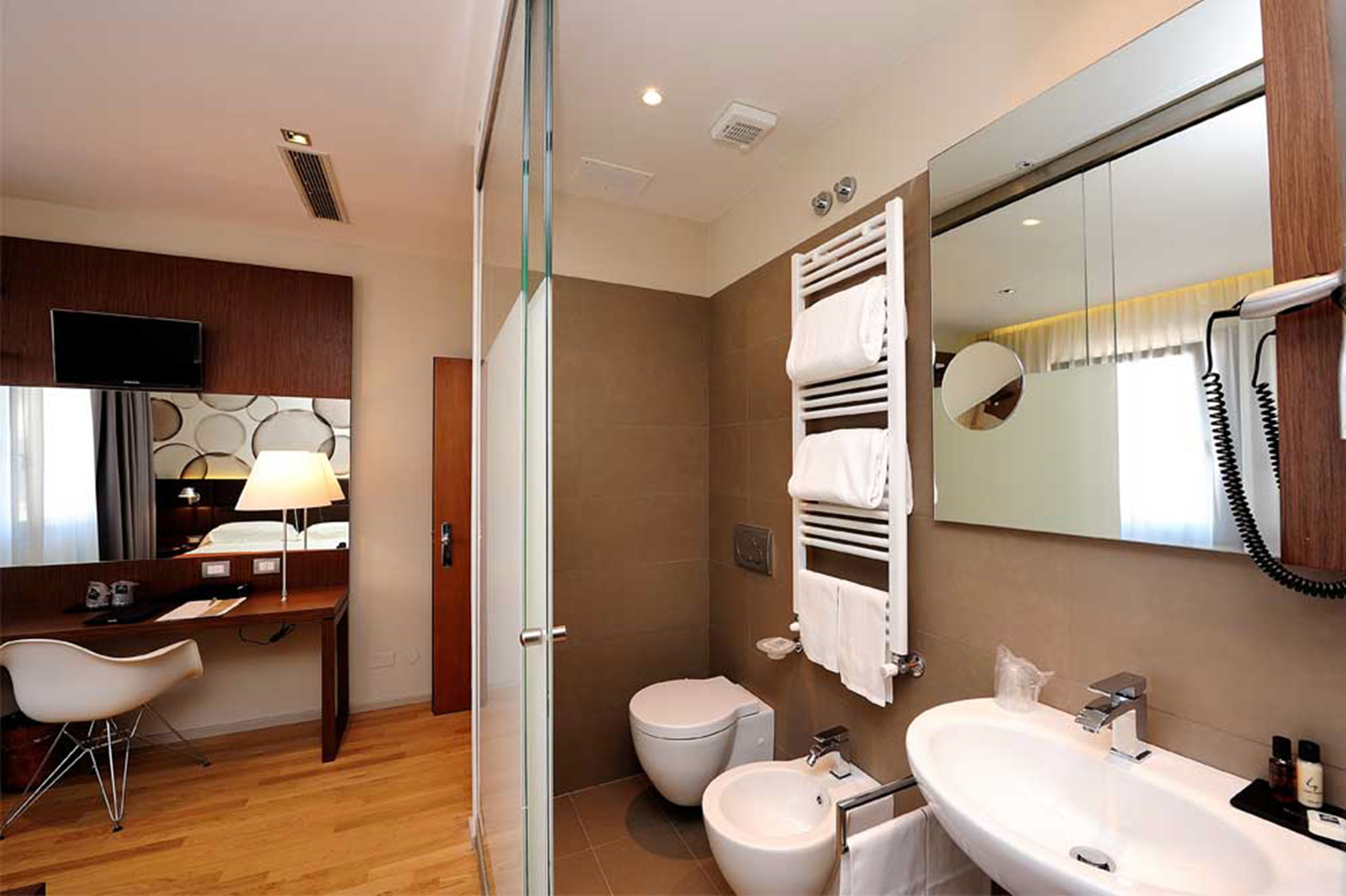 design double or twin room | bathroom | shower, free toiletries, hair dryer, bathrobes
