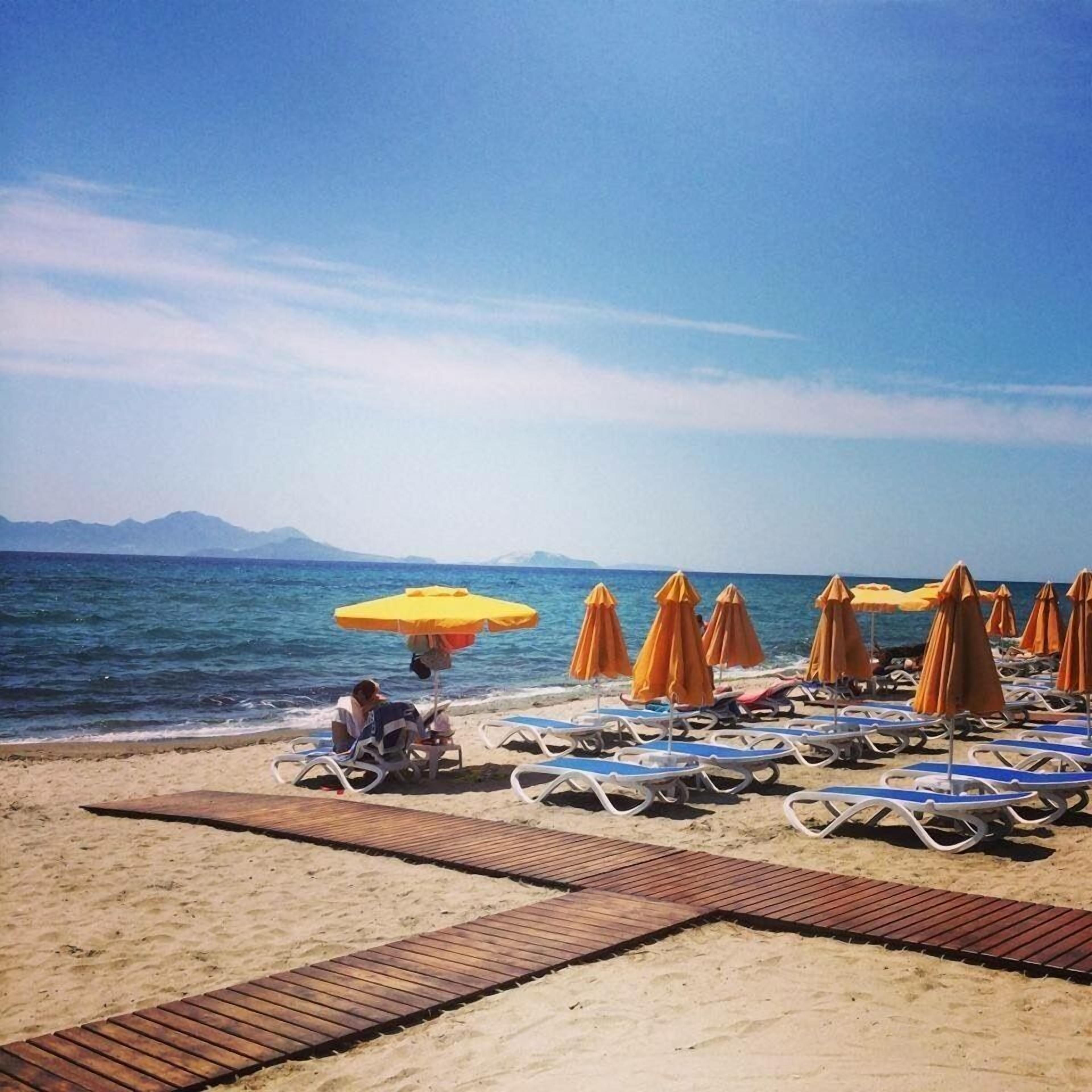 Private beach, water skiing, windsurfing, beach volleyball