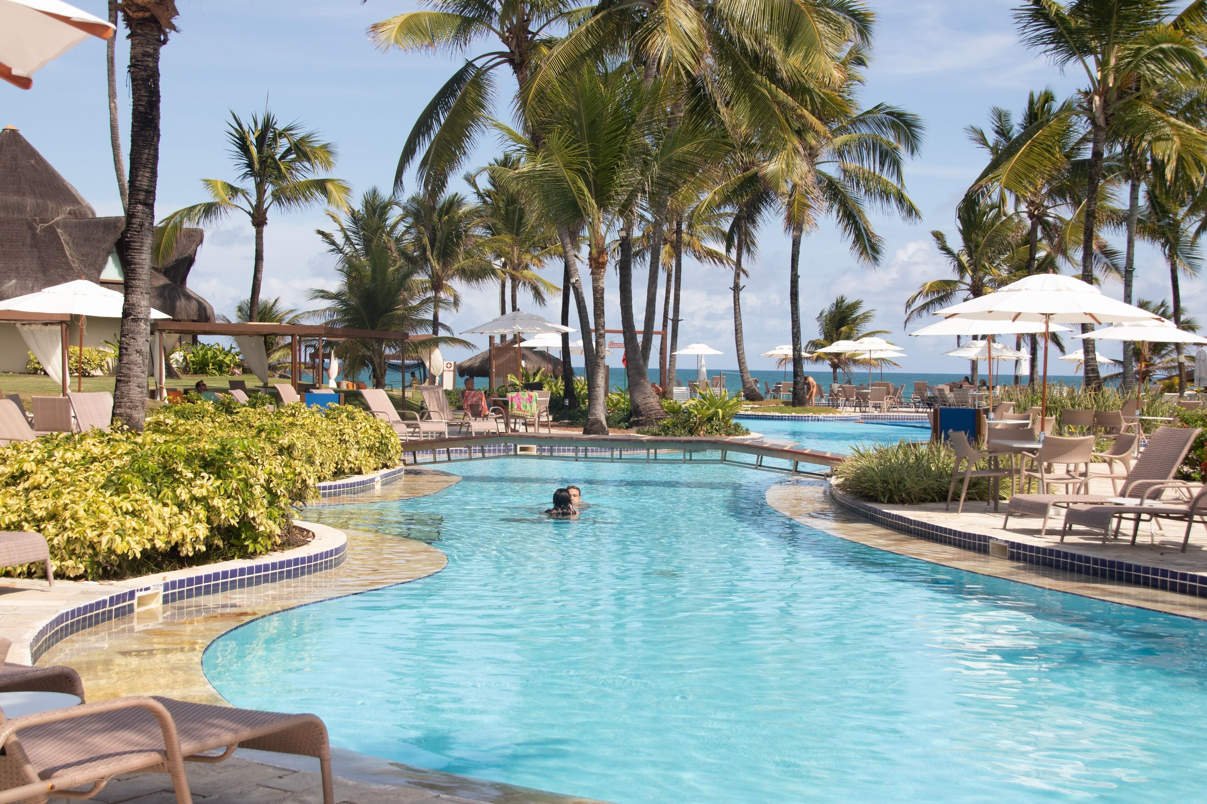 Outdoor pool, pool umbrellas, sun loungers
