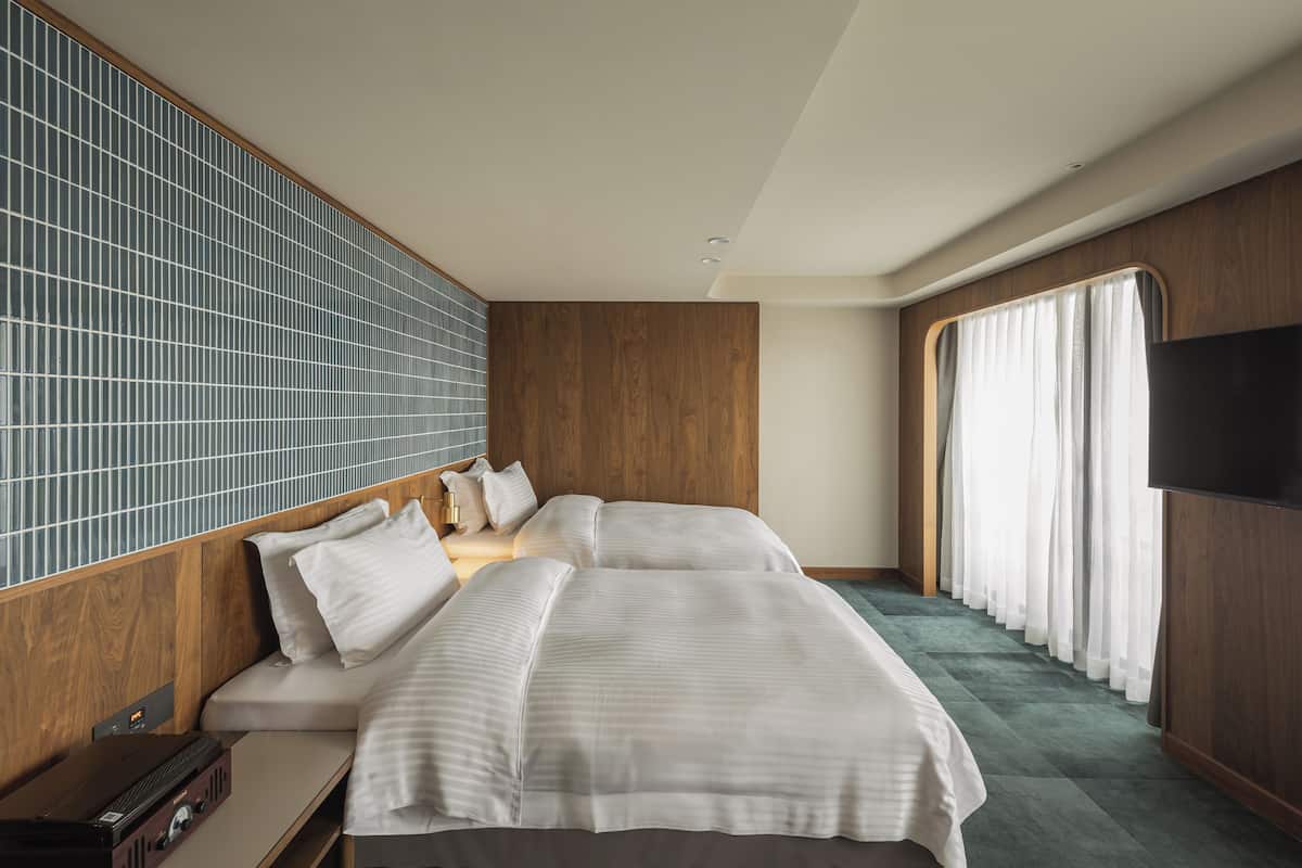 Deluxe-Zweibettzimmer, 2 Einzelbetten | Verdunkelungsvorhänge, kostenloses WLAN, Bettwäsche