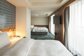 Cortinas blackout, wifi gratis y ropa de cama 