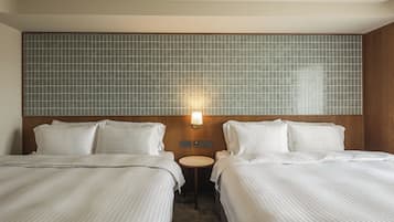 Habitación cuádruple estándar | Cortinas blackout, wifi gratis y ropa de cama