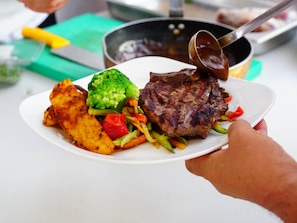 A plate of food with steak, broccoli, and roasted potatoes. - Blue Dreams Resort-Ultra All Inclusive (Bodrum)