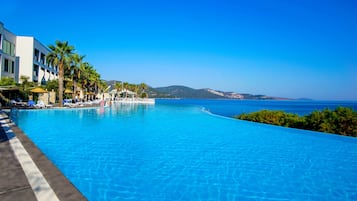 4 piscinas al aire libre, cabañas de piscina gratuitas, sombrillas