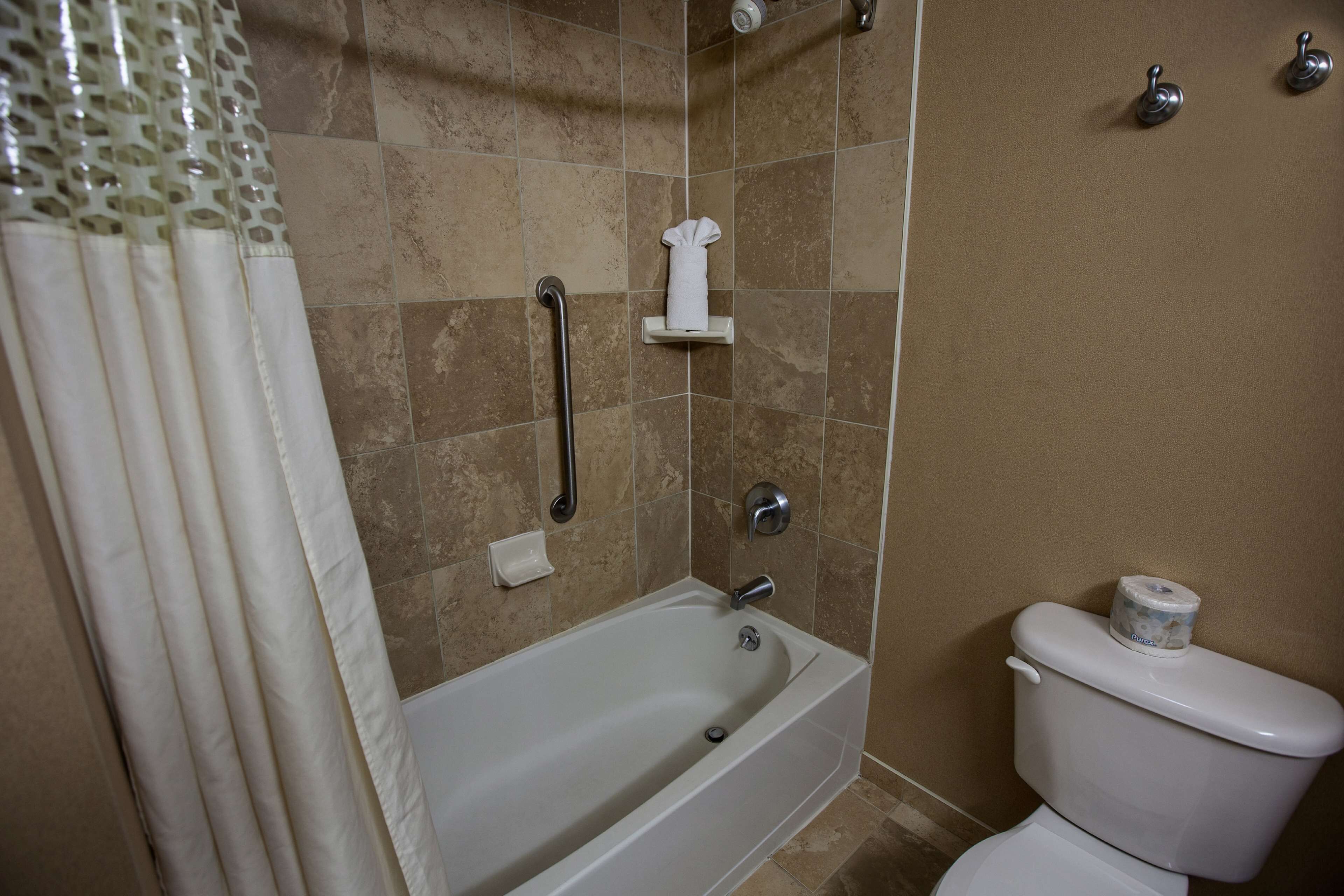two queen beds non smoking | bathroom | shower, hair dryer, towels, soap