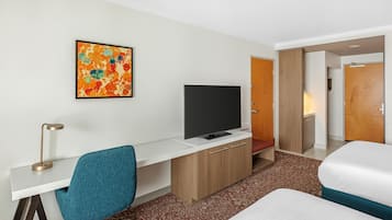 Desk, laptop workspace, blackout drapes, iron/ironing board