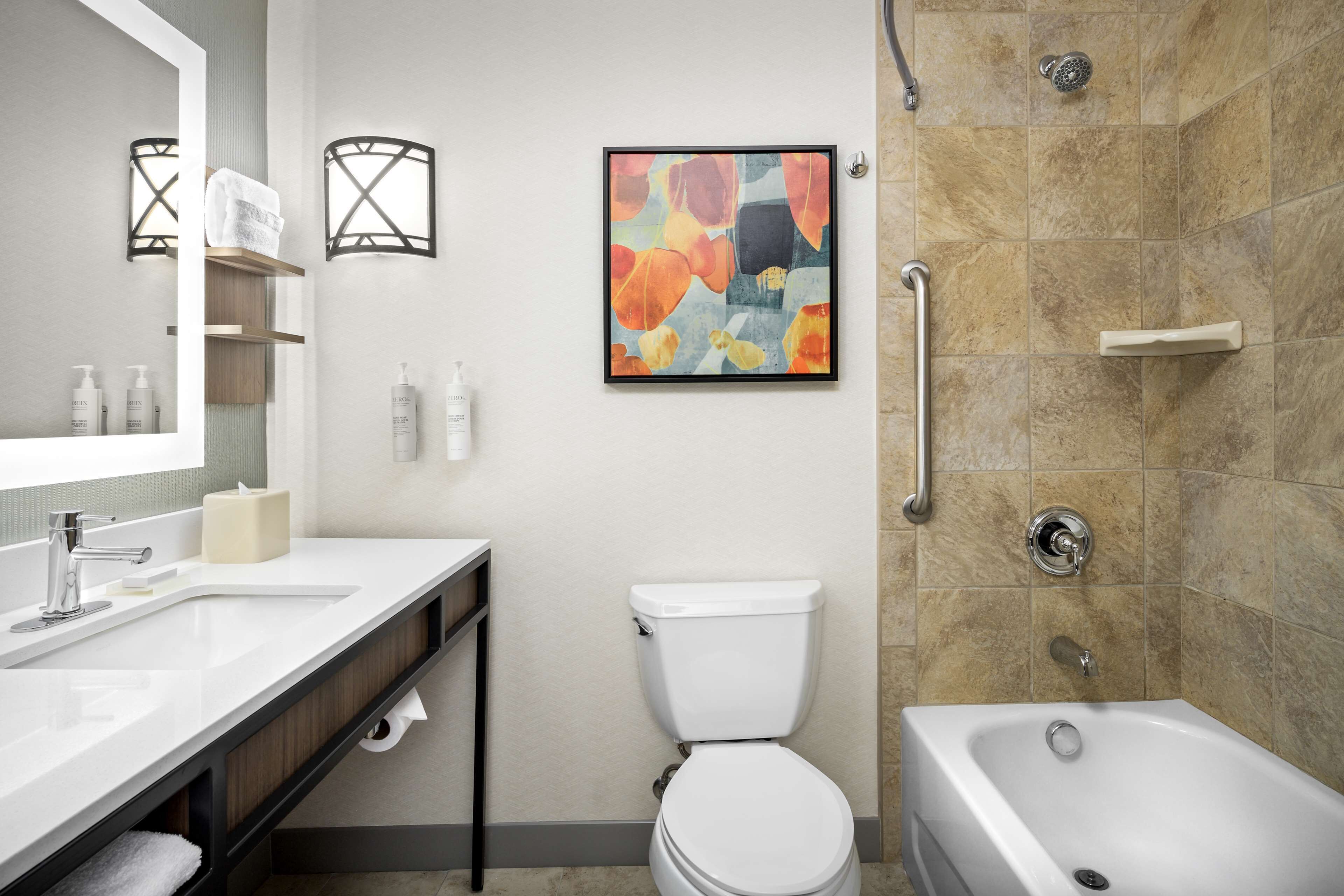 combined shower/bathtub, free toiletries, hair dryer, bathrobes