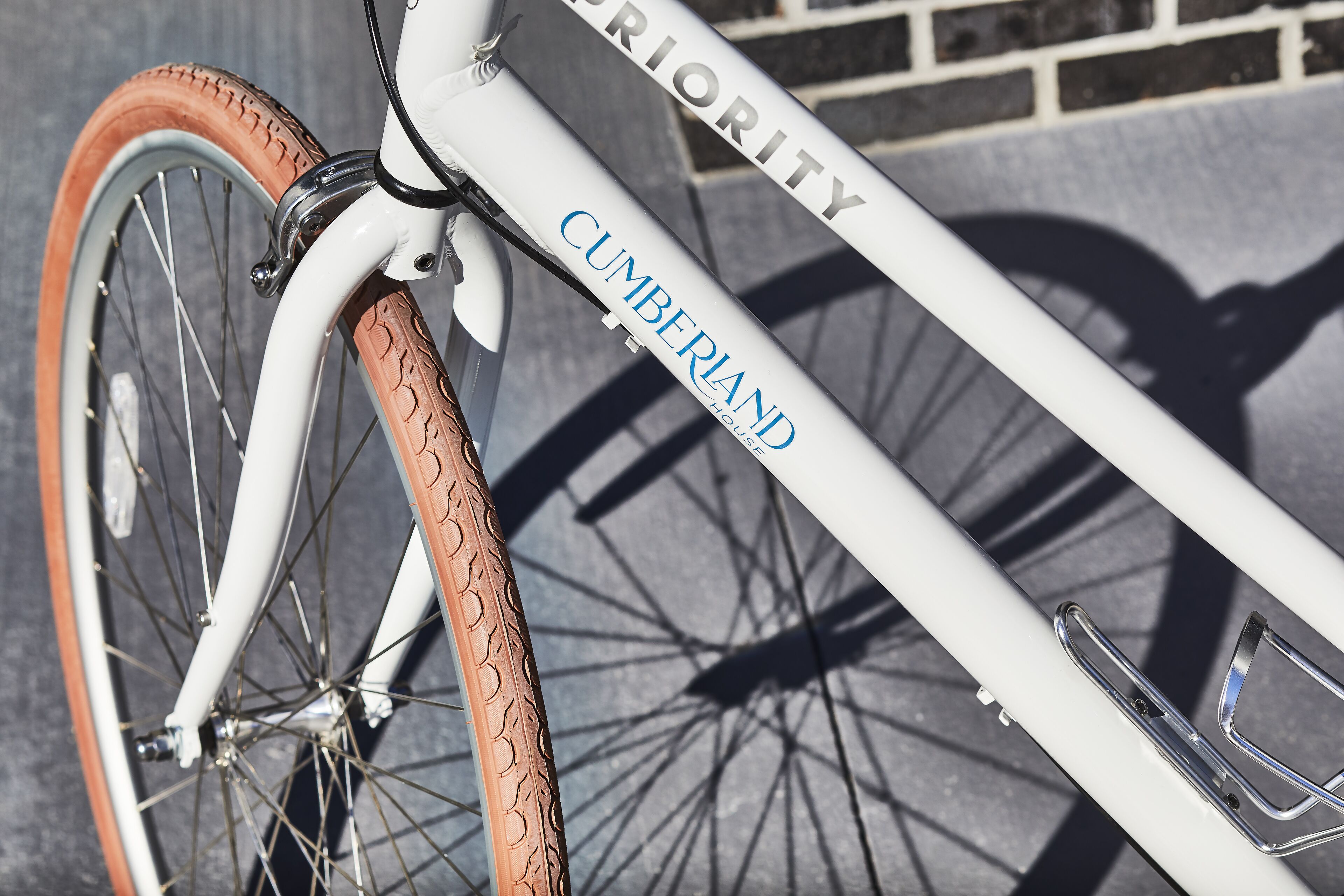 A bicycle with the brand name "CUMBERLAND" on the frame.
