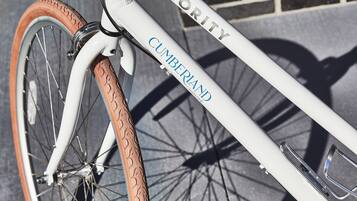 A bicycle with the brand name "CUMBERLAND" on the frame.