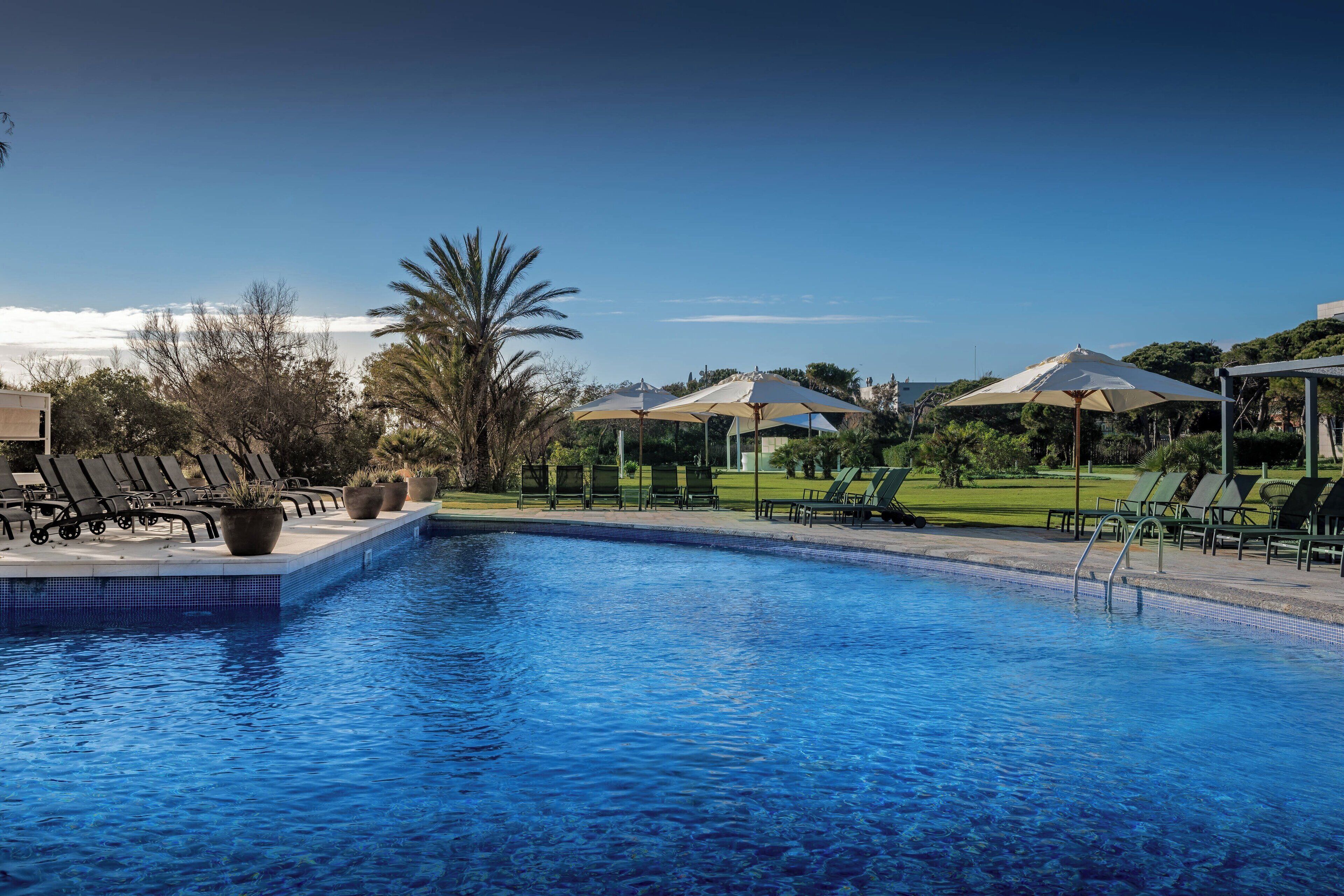 outdoor pool, pool umbrellas