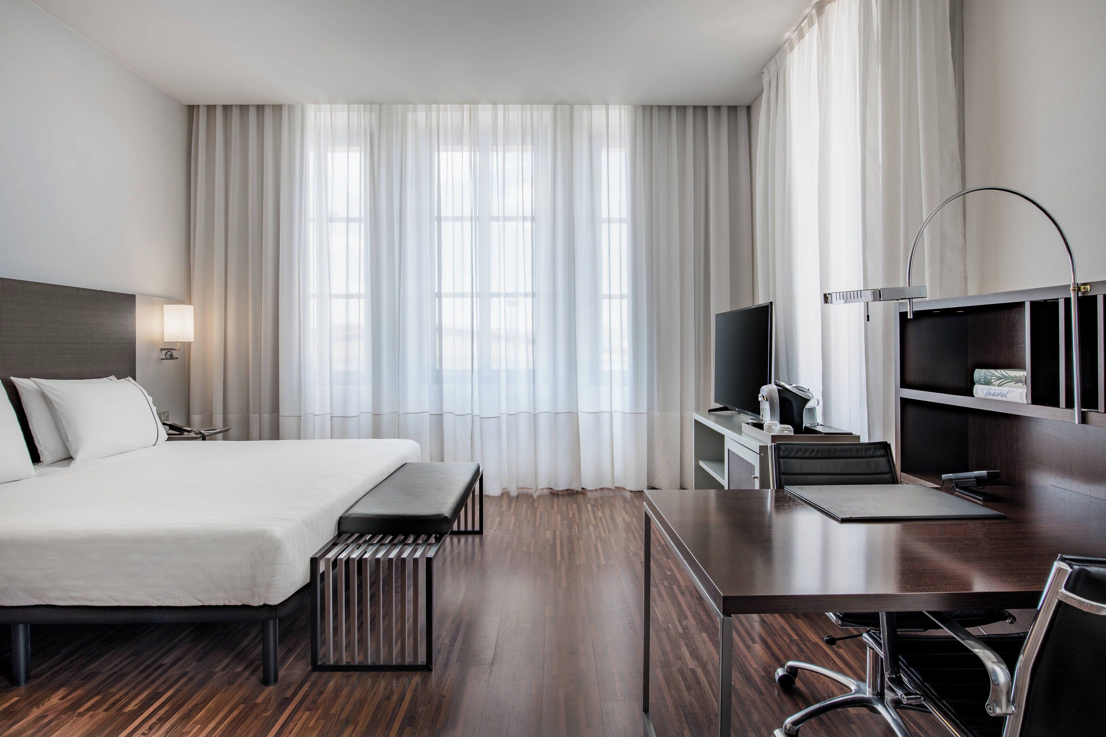 hypo-allergenic bedding, pillow-top beds, minibar, in-room safe