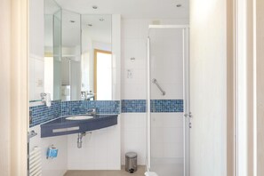 Shower, free toiletries, hair dryer, towels