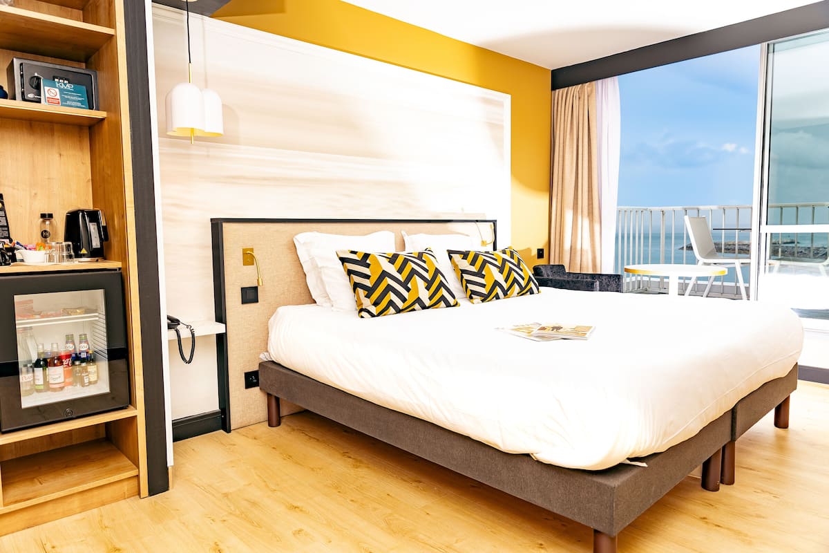 Exclusive Double Room, Terrace, Sea View | Minibar, in-room safe, individually furnished, desk
