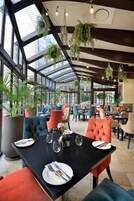 Breakfast, lunch, dinner served; international cuisine, alfresco dining 