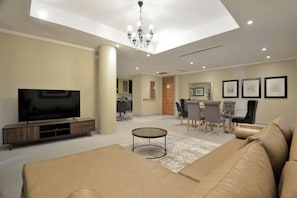 Executive Suite, 1 Bedroom | Living area | TV, DVD player, pay movies - Raphael Penthouse Suites (Sandton)