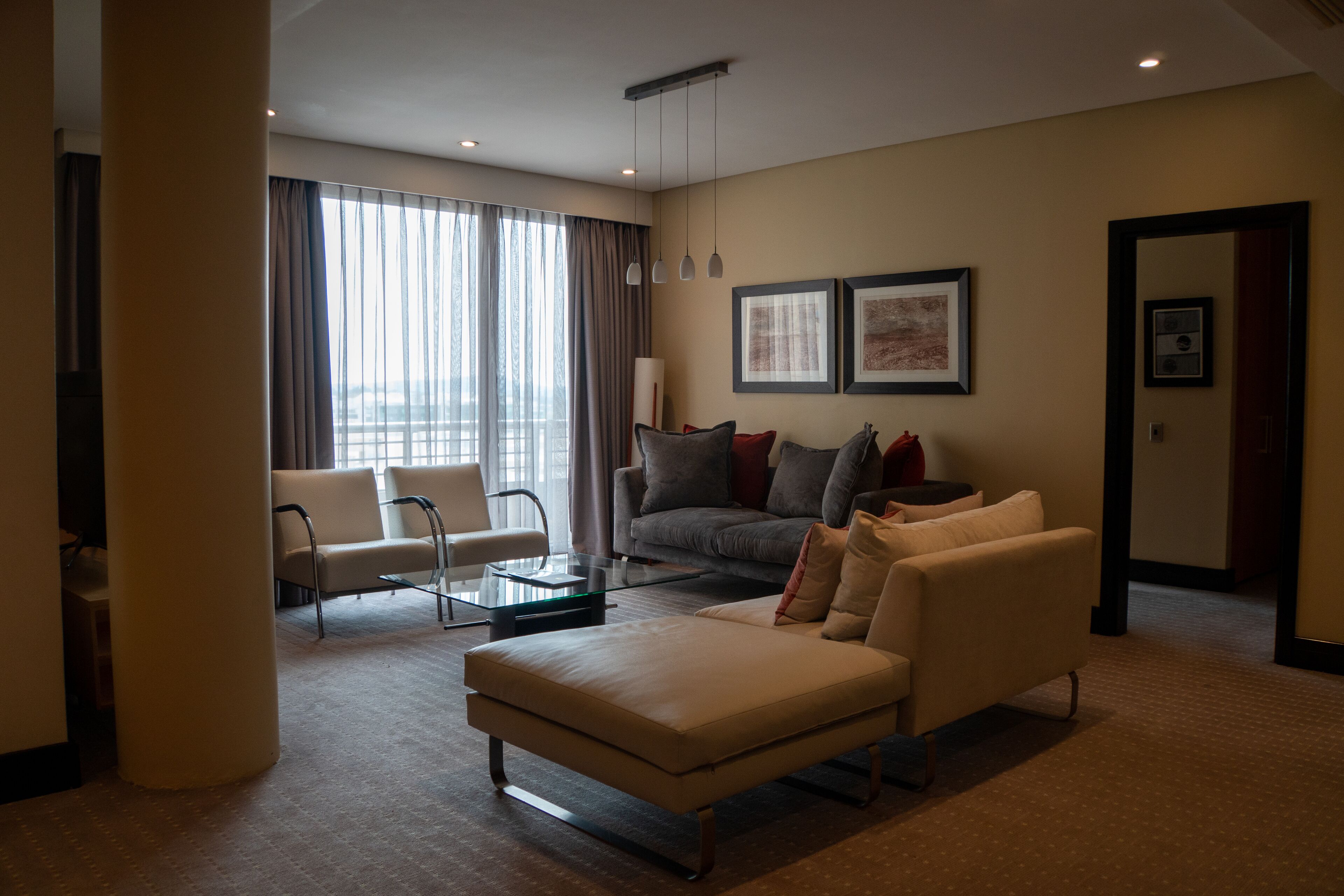Executive Suite, 1 Bedroom | Living area | TV, DVD player, pay movies